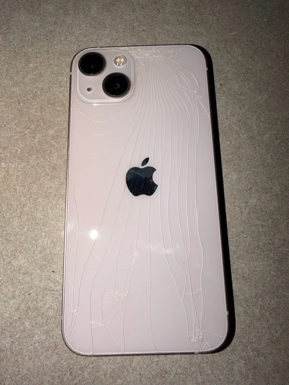 Apple iPhone 13 - Verizon, Light Pink Back Glass is cracked